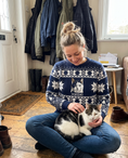 Load image into Gallery viewer, Custom Pet Knitted Holiday Sweater - Winter Sky Blue - worn at home with a custom black-and-white cat portrait named DOMINO | Alpha Paw
