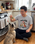 Load image into Gallery viewer, Santa Patrol unisex tee in Athletic Heather with a custom Cairn Terrier design | Alpha Paw
