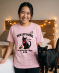 Load image into Gallery viewer, On the Nice List (Maybe) unisex tee in Pink with a custom black cat design | Alpha Paw
