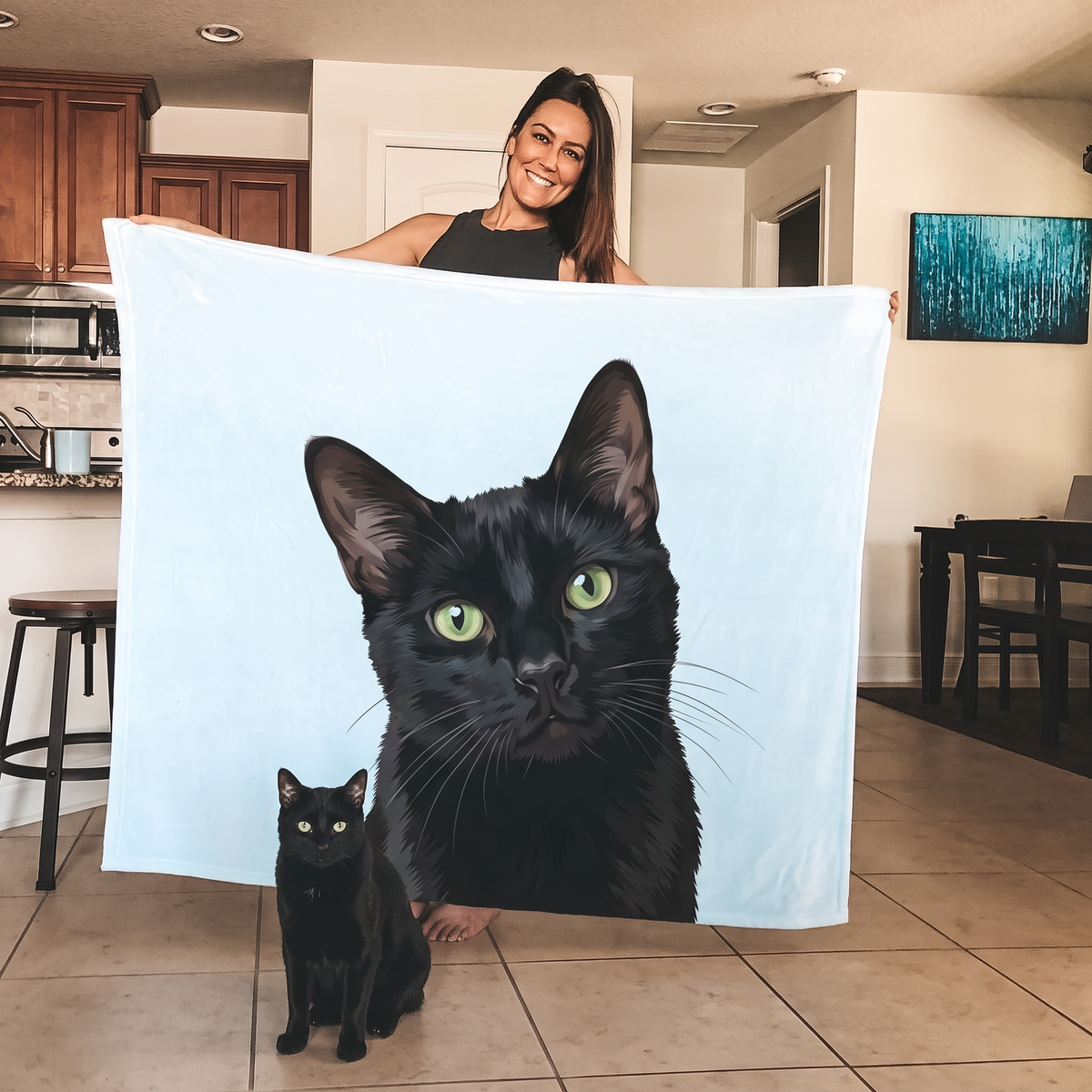 Green-eyed black cat on a personalized photo fleece blanket