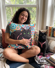 Black cat on a personalized pet couch pillow