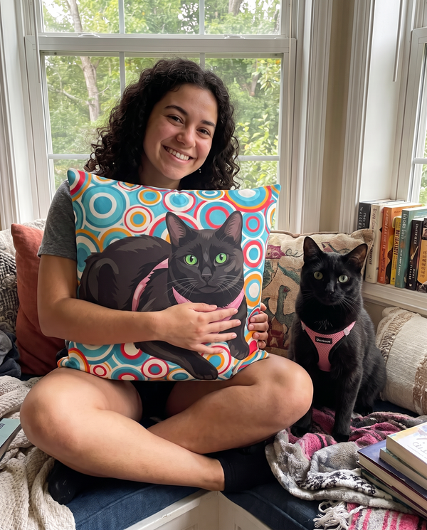 Black cat on a personalized pet couch pillow